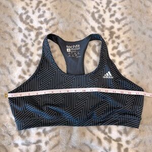 Adidas black with gray line detailing sports bra.